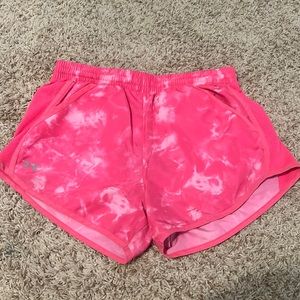 Pink under armour shorts with pockets medium